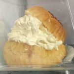 Cream bun in a takeaway box